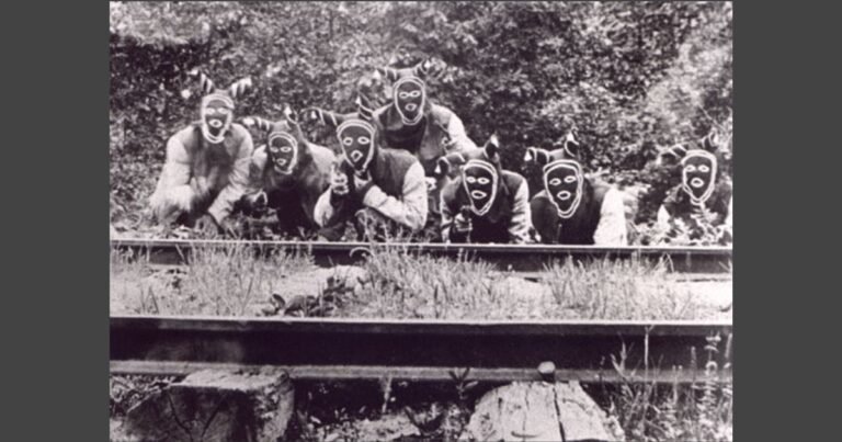 Portrayal of the Bald Knobbers in the 1919 film The Shepherd of the Hills. Public domain.