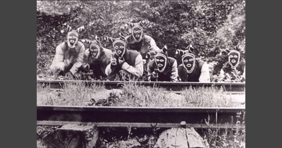 Portrayal of the Bald Knobbers in the 1919 film The Shepherd of the Hills. Public domain.
